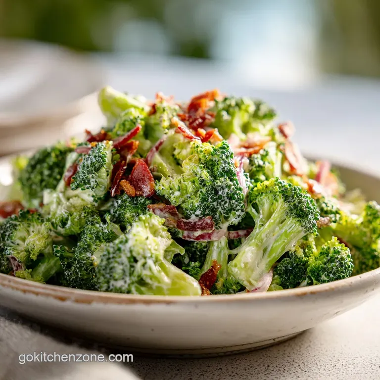 Broccoli salad plated elegantly: bright green, crunchy texture, crumbled bacon, creamy dressing drizzle, inviting side dish.